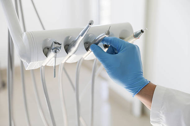 Professional Tooth Extraction technician working in Woodcrest, CA